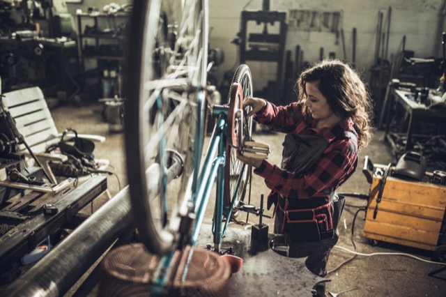 Mechanic fixing bike